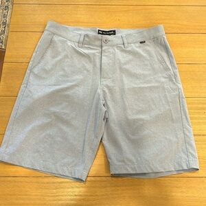 Travis Mathew flat front shorts in light slate blue, size 34